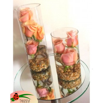 Floreros sobre espejo